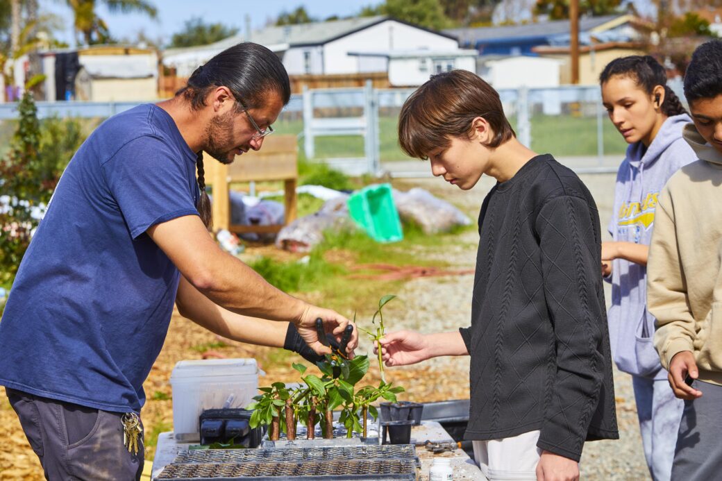 Team Alpha: Ricardo, Caden, Xochitl, and Omar working in the field