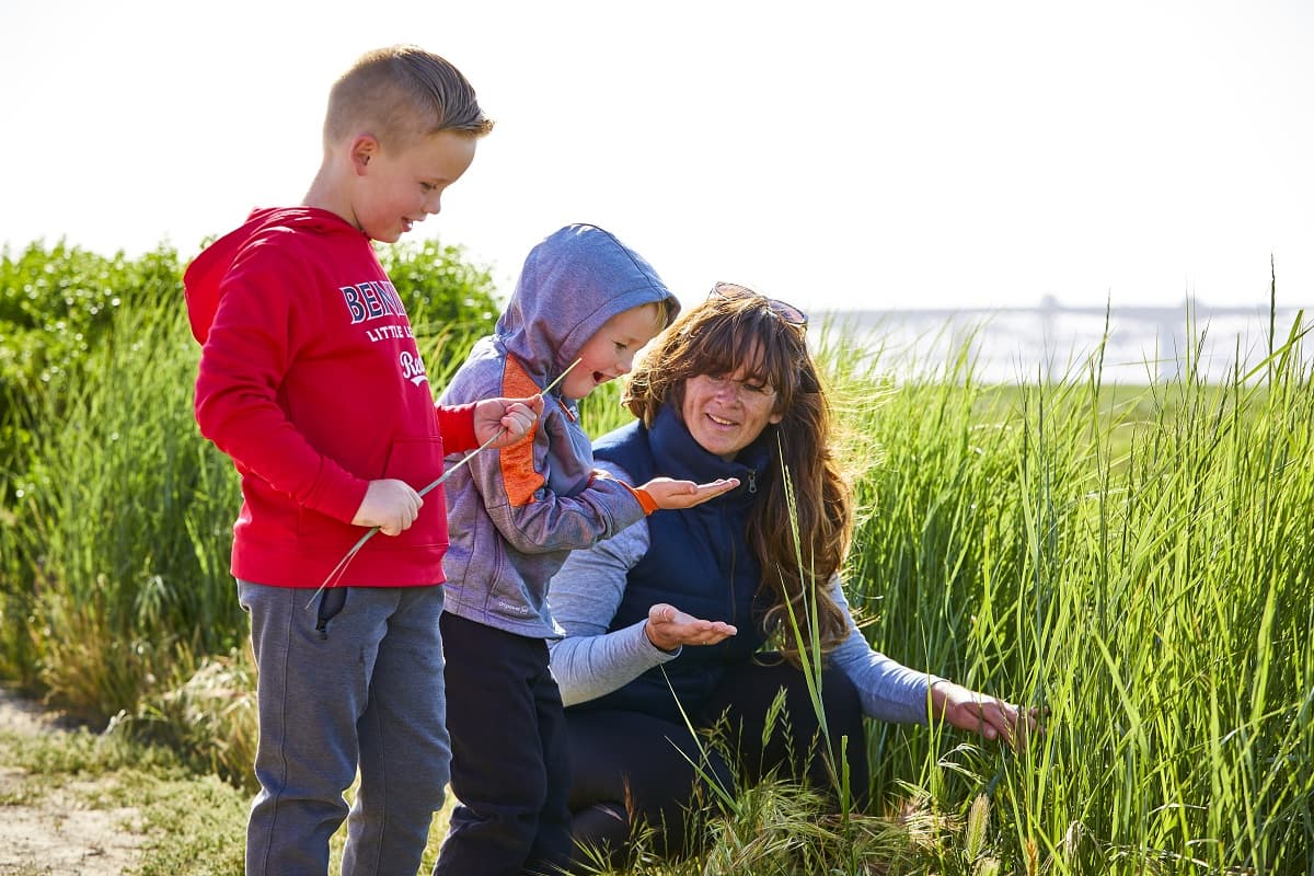 Families enjoying nature education program