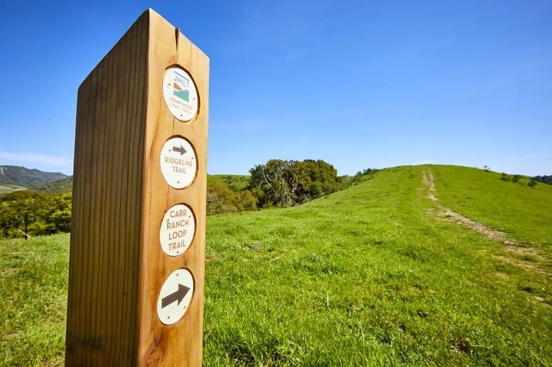 Ridgeline hiking trail with panoramic valley views